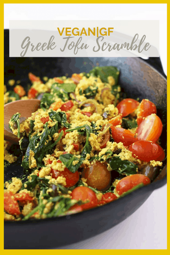 Start your day off right with this hearty and wholesome vegan Greek Tofu Scramble. It is made with seasoned tofu, olives, spinach, and fresh tomatoes for a delicious plant based and gluten free meal.