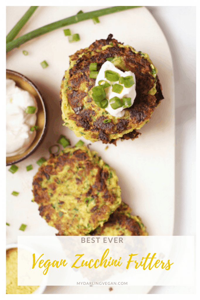 These warm and zesty vegan zucchini fritters!  Made in just 20 minutes, they make the perfect breakfast, lunch, or dinner. Top with vegan sour cream and fresh green onions for a simple and delicious meal. 